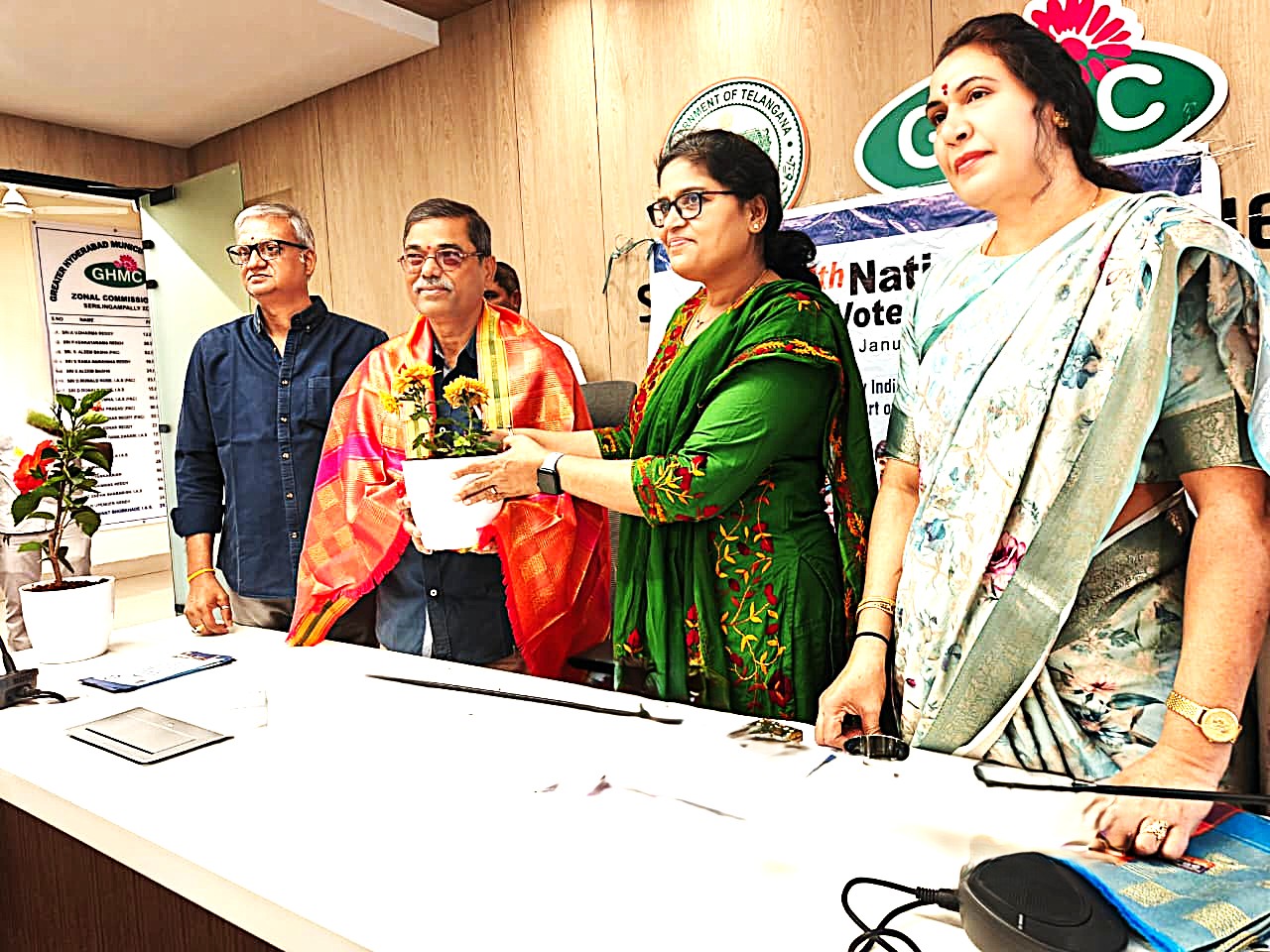 3 The Dy. Commissioner GHMC Zonal office, Serilingampally honouring  Pandurangaiah garu Joint Secretary of Senior Citizen association.jpeg